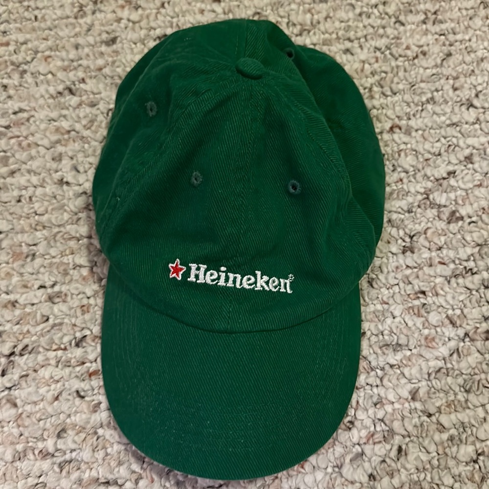 Heineken green hat.